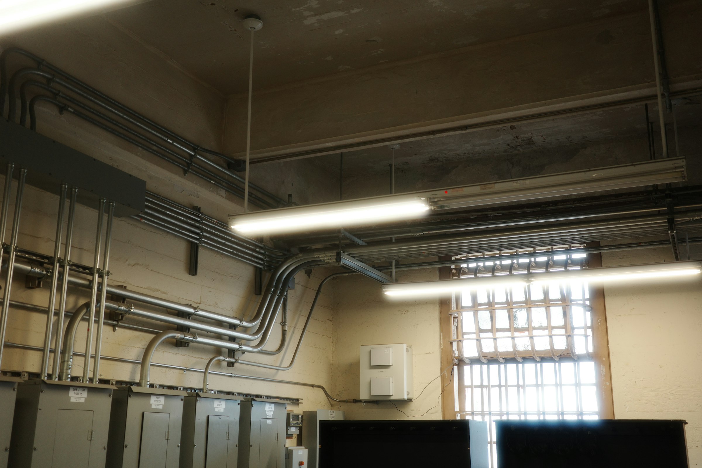Lighting and wiring installed through a commercial space